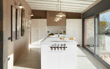 Kitchen opens to large terrace for outdoor meals 